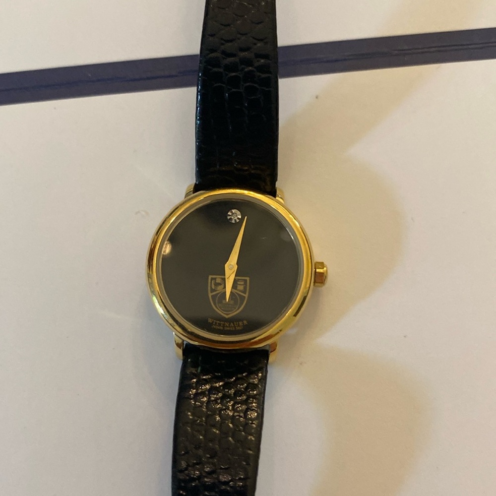 Wittnauer gold watch with lizard grain black strap